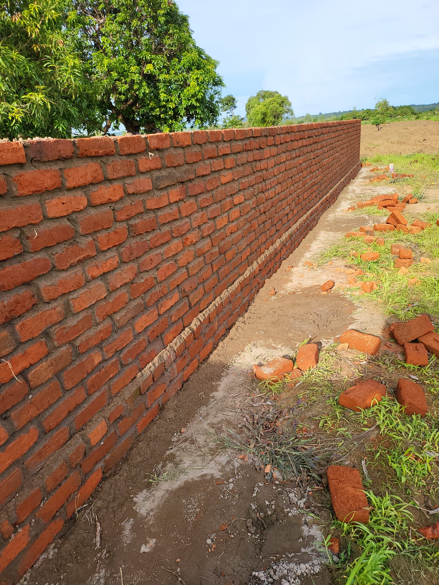 Security Fence Underway with Locally-Made Cement Blocks